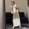 Conjunto de Moda Suave Estilo Francés, un Conjunto Completo de Faldas Largas Florales para Mujer, Nuevo Estilo Verano 2026 Conjunto de Vestido Chaleco sin Mangas