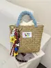 Bolso de Mano de Bloques de Color Estilo Coreano 2026 Bolso de Cesta de Paja Bolso Tejido a Mano para Vacaciones en la Playa Bolsos para Mujer