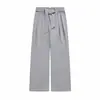 Calça estilo espada listrada, tecido misto, firme e estruturada, com padrão sutil, calça casual de corte reto, disponível em preto e cinza, com detalhes em pelo de coelho