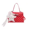 Estilo Coreano Sistema Coreano Transfronterizo 2026 Diseño de Hebilla con Estampado de Puntos Redondos Bolso de Mano para Mujer Bolso de Hombro Bolso Cruzado Bolso Cuadrado Pequeño