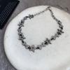 Hip hop oscuro dulce fresco Super Brillante pedrería estrella de cinco puntas hueso planeta letra aretes collar personalidad joyería europea y americana