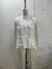 Moda al por mayor para mujer europea y americana 2026: Chal de Trabajo Elegante y Estiloso con Cordón, Bolsillo Elástico Abotonado y Cuello Alto
