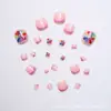 24 piezas de armadura para adultos terminada nuevo estilo lindo dulce patrón de cara sonriente de flor desmontable transfronterizo