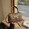 2026 Nuevo Color Sólido Casual Gran Capacidad Texturizado para Viajes Diarios Simple Moda Bolso de Mano Hombro Cruzado Pequeño Cuadrado