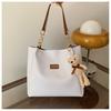 Bolso de mano sencillo con textura, bolso de viaje, nuevo y popular bolso de hombro para mujer de color sólido, bolso de mujer de gran capacidad de color sólido.