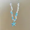 Collar de perlas, conchas y estrellas de mar con cuentas estilo vacación en la playa para mujer, accesorio de cadena para clavícula de nicho de hadas de Instagram para hombre