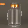Atacado em Estoque Garrafas Plásticas Transparentes de 50ml 100ml com Tampas Douradas e Prateadas, Pequenas Garrafas para Remédios, Garrafas com Boca Larga para Dosagem, Garrafas com Boca Larga para Cápsulas