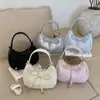 Bolso de Viaje de Gran Capacidad de Moda 2026 Nuevo Modelo Color Sólido Elegante Lazo Bolso Cruzado de Hombro Axila Bolso de Mano Bolso Dumpling