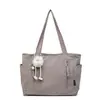 Bolsa de Tote de Tela Lavada de Nylon con Diseño de Nicho para Mujer Nueva de Gran Capacidad Bolso de Hombro Estudiantes Universitarios Yendo a Clase