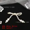 Varios accesorios de lazo de perlas, pasadores para el cabello con forma de lazo hechos a mano con cuentas, broches y accesorios para la ropa, venta al por mayor de fábrica
