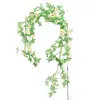 Flores artificiales, flores falsas, enredaderas de flores, guirnaldas de flores de margarita, flores decorativas de plástico, decoraciones colgantes, girasoles al por mayor