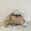 Bolso de mano francés de nicho texturizado elegante para mujer otoño comercio exterior simple retro mate casual bandolera cruzada