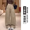 Calça de terno cinza escuro com caimento sofisticado, nova coleção outono 2026 feminina, cintura alta, solta, casual, plissada, perna larga
