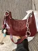 Bolso nuevo para mujer 2026, moderno y elegante, alto valor estético, bolso cuadrado pequeño, único y simple, color liso, bolso de hombro y cruzado, versión coreana