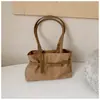Bolsos de mano para mujer transfronterizos, nueva colección de otoño 2026, bolso de hombro de nicho de lujo ligero de alta gama, gran capacidad para el trabajo y los desplazamientos