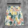 Comercio Exterior 4043 Nuevos Pantalones Cortos de Cinco Puntos de Verano para Hombre Estampado Hawaiano Pantalones Sueltos Pantalones Cortos Estilo Playa para Hombres Jóvenes