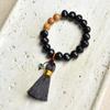 Pulsera de Semillas de Girasol Natural y Raíz de Bodhi con Estrella y Luna Tostada al Carbón Bodhi Pulsera con Borla Linda Estilo Labubu