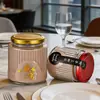 Venta Directa de Fábrica Botellas de Embalaje con Rayas Verticales para Nido de Pájaro, Vidrio Resistente a Altas Temperaturas, Botellas para Cocción Lenta al Vapor, Frascos Sellados de Grado Alimenticio para Alimentos de Vejiga de Pez
