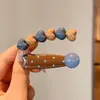 Pinzas laterales estilo dopamina con un toque de alta gama, pinzas delicadas con flecos para niñas, pasadores dulces, pinzas de cocodrilo a la moda