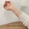 Pulsera de Estrella Fresca Dulce Moderna Versátil Colorida para Mujer Cuerda Ajustable de Tirar Diseño de Nicho Sensación de Alta Gama Joyería de Mano para Mujer