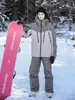 Nuevo Traje de Snowboard para Mujer y Hombre Impermeable Algodón Adhesivo Cortavientos Cálido Nicho Americano Color Sólido Ropa de Exterior