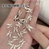 Arte de uñas nuevo acabado nacarado destello fino circón mariposa destello roto plata diamante mariposa destello explosivo taladro de uñas 9*12mm