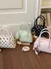 Bolso Boston de lunares de nicho estilo coreano transfronterizo para mujer, nuevo de moda 2026, versátil, de gran capacidad, para hombro y cruzado