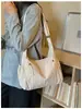Bolso nuevo para mujer 2026 transfronterizo, bolso de gran capacidad moderno para estudiantes universitarios, bolso de hombro y cruzado de moda para ir al trabajo