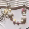 Cadena de Teléfono de Felpa Serie Color Macaron, Colgante de Perlas Dulce y Femenino, Correa de Muñeca para Funda de Teléfono Universal, En Stock