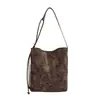Bolsa tote casual de moda retrô para mulheres, novo estilo coreano outono/inverno 2026, bolsa de ombro transversal versátil de grande capacidade para o dia a dia