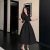 Vestido largo de manga larga vintage color caqui Muye Otoño 2026 Transfronterizo para Mujer, Línea A Delgado de Cintura Alta con Pliegues