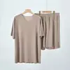 Pijama sin costuras de seda helada para hombre y mujer, nuevo estilo de verano para parejas, ultradelgado y cómodo, cuello redondo, conjunto de ropa casual de manga corta acanalada