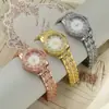 Nuevo Estilo Coreano Moda Casual Banda de Acero Diamante Reloj para Mujer Cara de Pedrería Completamente Diamantado Patrón Romano Reloj de Cuarzo Venta al por Mayor