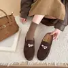 Hebilla Versátil 2026 Nuevas Mules Deslizables Puntera Metálica Mules Suela Plana Estilo Dinero Otoño Slip-ons Mujer Retro Antiguo