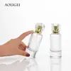 Venta al por mayor de fábrica botella de perfume cilíndrica de 50 ml botella vacía tipo press cosmético botella de spray fino muestra sub-embotellado tapa de madera