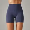 Pantalones de yoga de estilo nuevo sin línea de vergüenza color piel para mujer, cintura alta, realce de glúteos, compresión abdominal, shorts deportivos de tres puntos