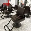 Silla de salón de peluquería para cortar, rizar y peinar, diseño popular, estilo guerrero negro, altura ajustable, giratoria y reclinable, adecuada para barberías