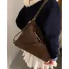 Bolsa de Camurça Personalizada para Mulheres 2025 Nova Tendência Moda Estilo Universitário Bolsa Tote Grande Capacidade Bolsa Multifuncional Mochila