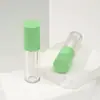 Nuevo tubo de brillo de labios en rosa con un degradado de ola, tubo de brillo de labios negro, herramienta dispensadora, material de empaque cosmético, tubo de brillo de labios vacío
