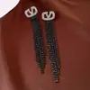 Brincos de Tarraxa Simples com Borla Oca Oval Inlaid de Diamante Agulha de Prata Leve Luxo Sensação de Alto Padrão Brincos Modernos Europeus Americanos Ornamentos Individuais para Orelha