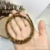 Otoño e Invierno Retro Maillard Piedra Ojo de Tigre con Cuentas Árbol de Agarwood Collar Pulsera Accesorios de Nicho de Gama Alta para Mujer