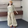 Conjunto Otoñal Estilo Coreano para Niñas 2026 Nuevo Modelo para Niños Mayores, Cárdigan a Rayas Color Block con Cuello Grande y Pantalones Cargo Conjunto de Dos Piezas