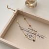 Collar de Acero de Titanio con Zircón de Color Trébol de Cuatro Hojas Nicho de Lujo Ligero sin Color Nuevo 2025 Cadena Clavicular de Alta Gama para Mujer