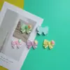 Novos acessórios fofos de gravata borboleta transparente em formato de coração para acessórios de cabelo DIY feitos à mão, capas de celular e patches para sapatos Crocs