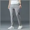 Pantalones casuales de verano para hombre, corte holgado, cintura elástica, pierna recta largos, pantalones de traje negros para primavera y otoño, estilo seda de hielo ultradelgada