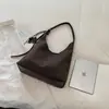 Bolsa tote de moda retrô personalizada para mulheres, versão coreana, adequada para trabalho e deslocamento, bolsa de ombro, nova bolsa de ombro versátil de outono 2026