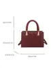 Nuevo modelo de otoño temprano 2026, bolso de mano sencillo con patrón de diamantes para mujer, bolso cruzado de moda con textura, bolso de hombro, bolsos de mujer al por mayor