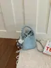Bolso de Mano de Alta Gama para Mujer de Comercio Exterior Transfronterizo, Nuevo Bolso Cubo Texturizado de Moda, Elegante Bolso Cruzado de un Solo Hombro, Moderno