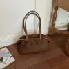 Bolso de gamuza para mujer, nuevo y moderno estilo retro de otoño 2026, adecuado para ir al trabajo, bolso de hombro de gran capacidad