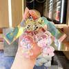 Llavero con forma de botella de arena movediza con forma de oso dragón de aceite famoso en Internet, colgante para coche, bonito y exquisito llavero con forma de mochila para pareja.